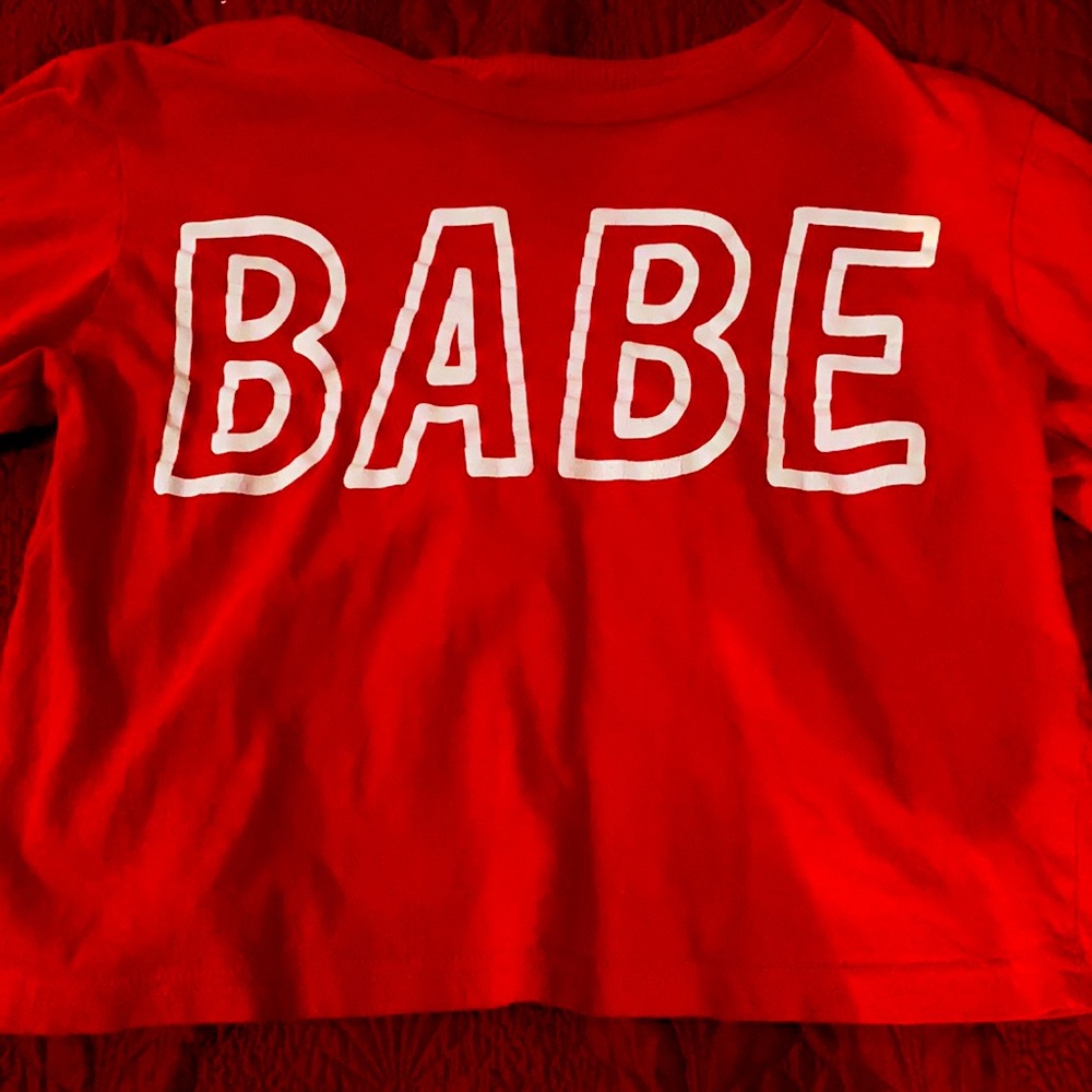 Never used. Red crop top. Babe written on it